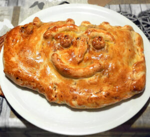 ‘mpanata con broccoli e salsiccia