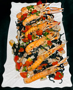 Spaghetti neri al pesce