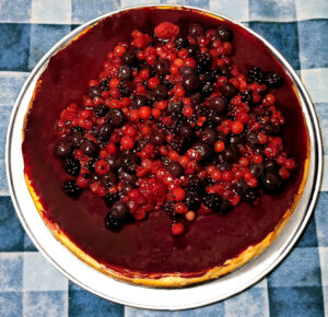Cheesecake con coulis di frutti di bosco