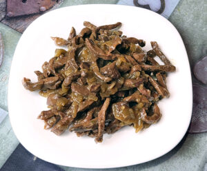 Cuore in umido con cipolle